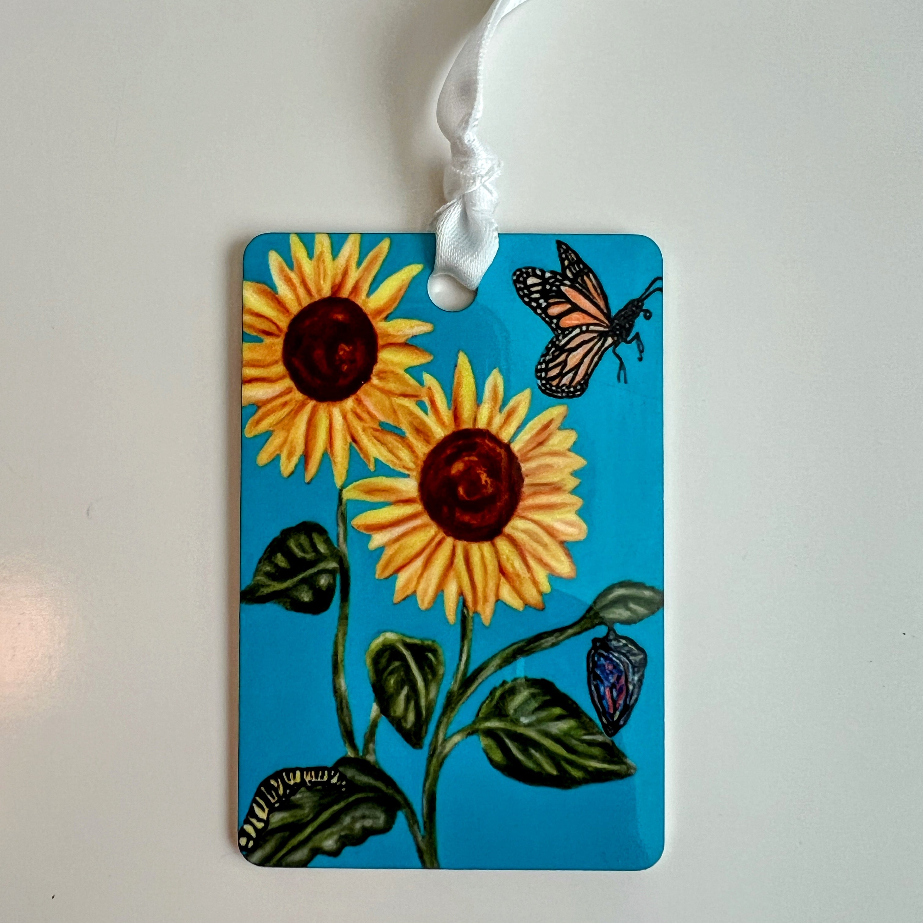 Sunflower ornament with blue background (rectangle shape)
