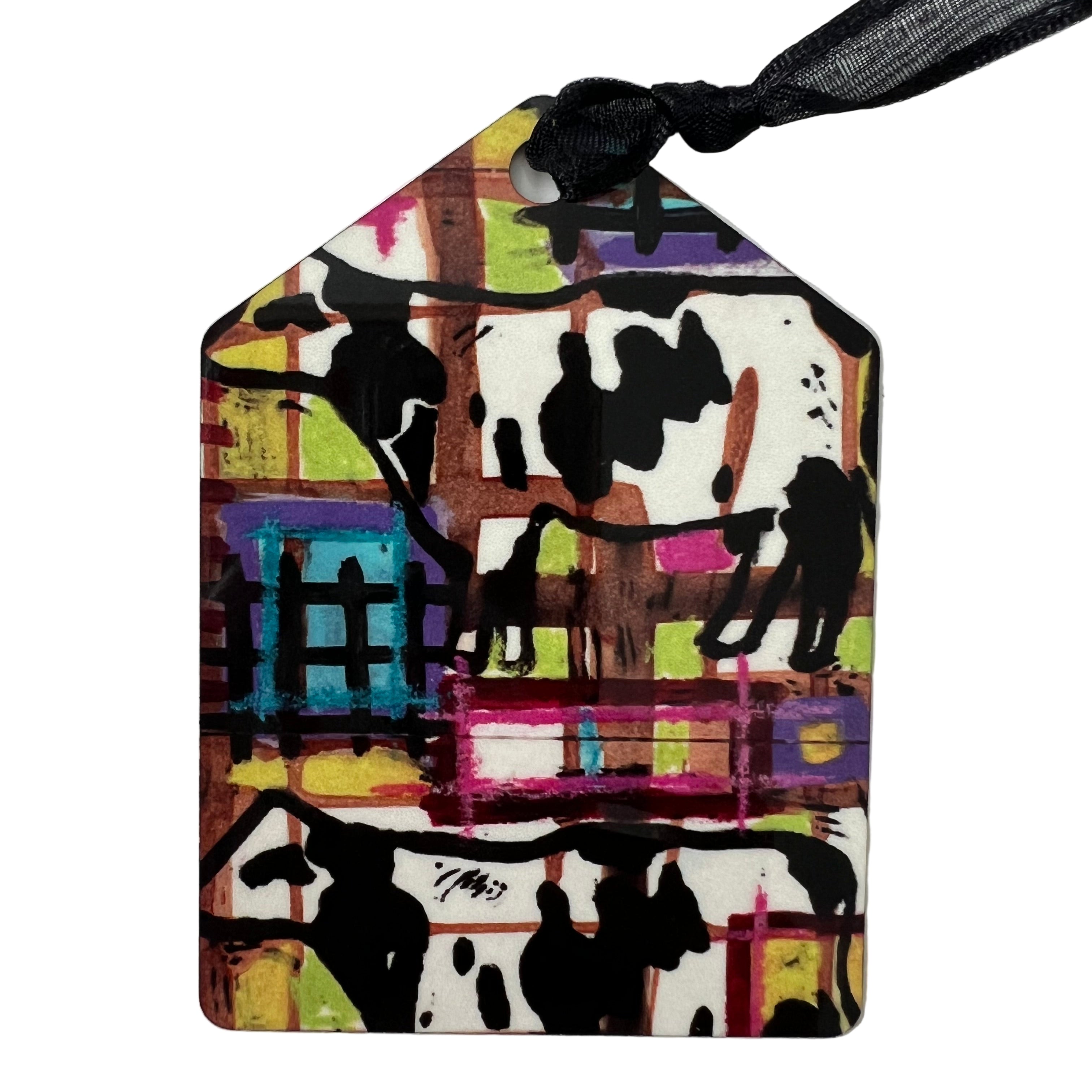 Cows on pentagon shaped ornament