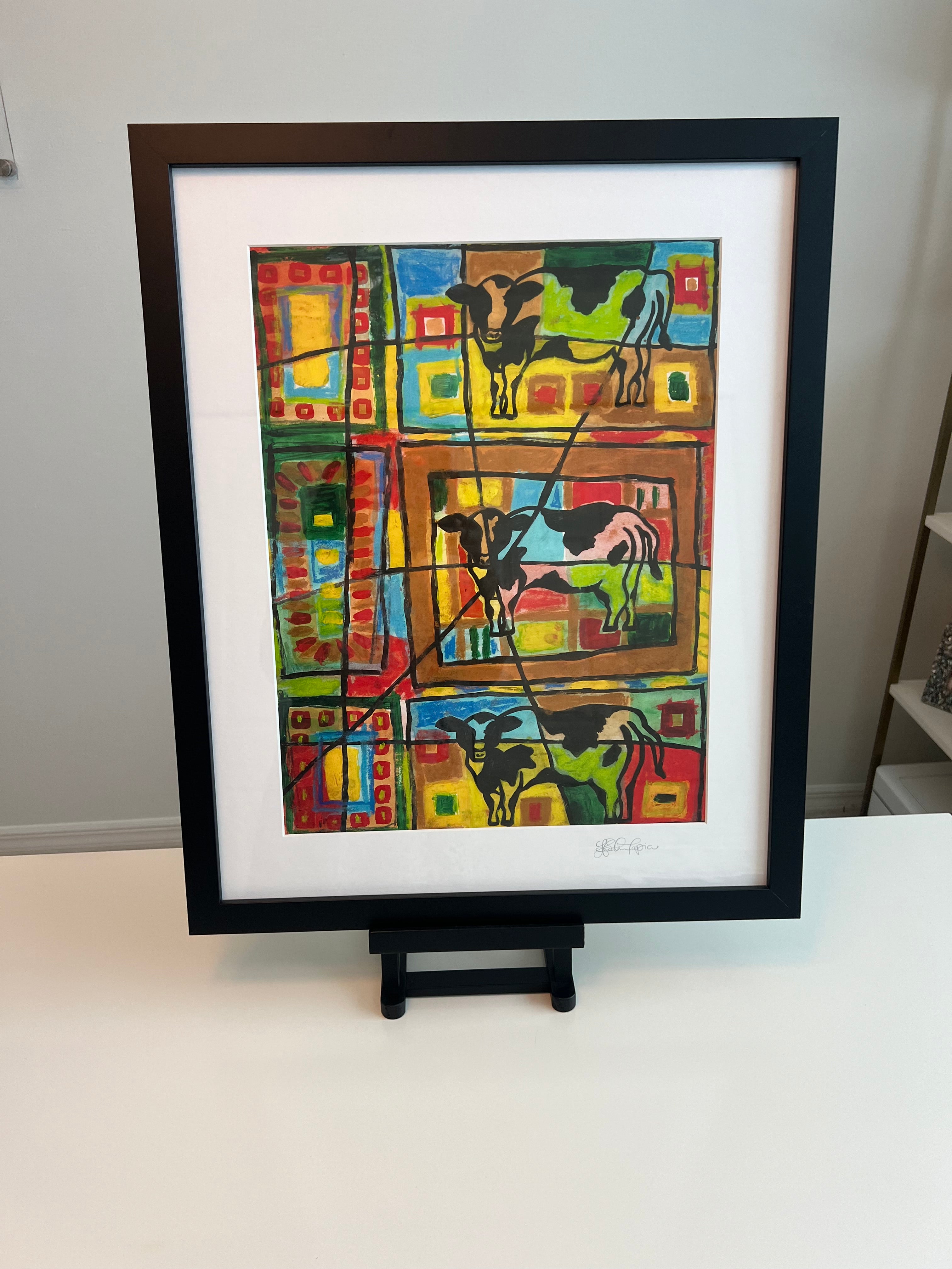Funky Cows painting with white matting and black frame